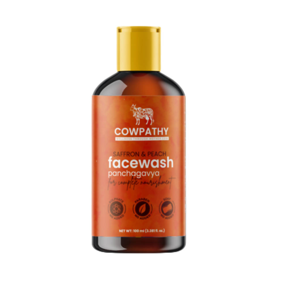 A tube of Cowpathy Saffron & Peech Panchagavya Face Wash against a white background.