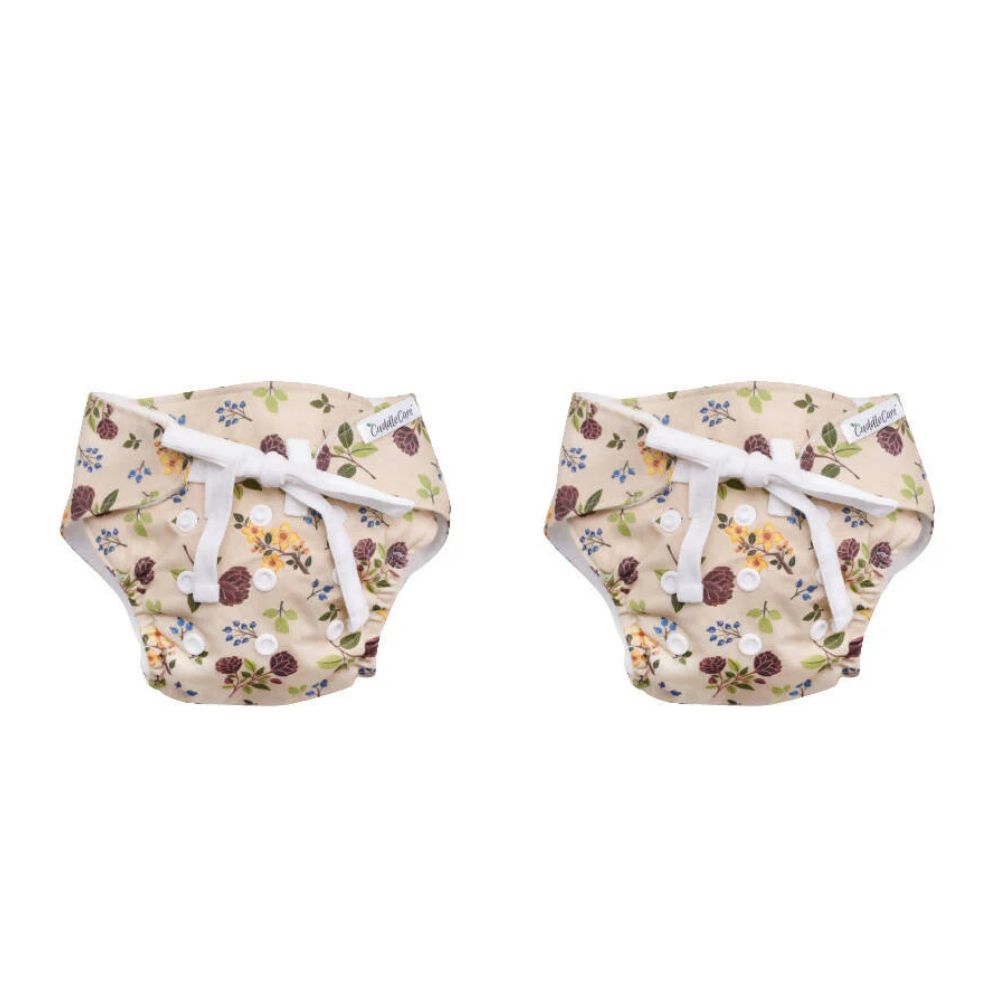 Two floral-patterned baby bloomers on a white background