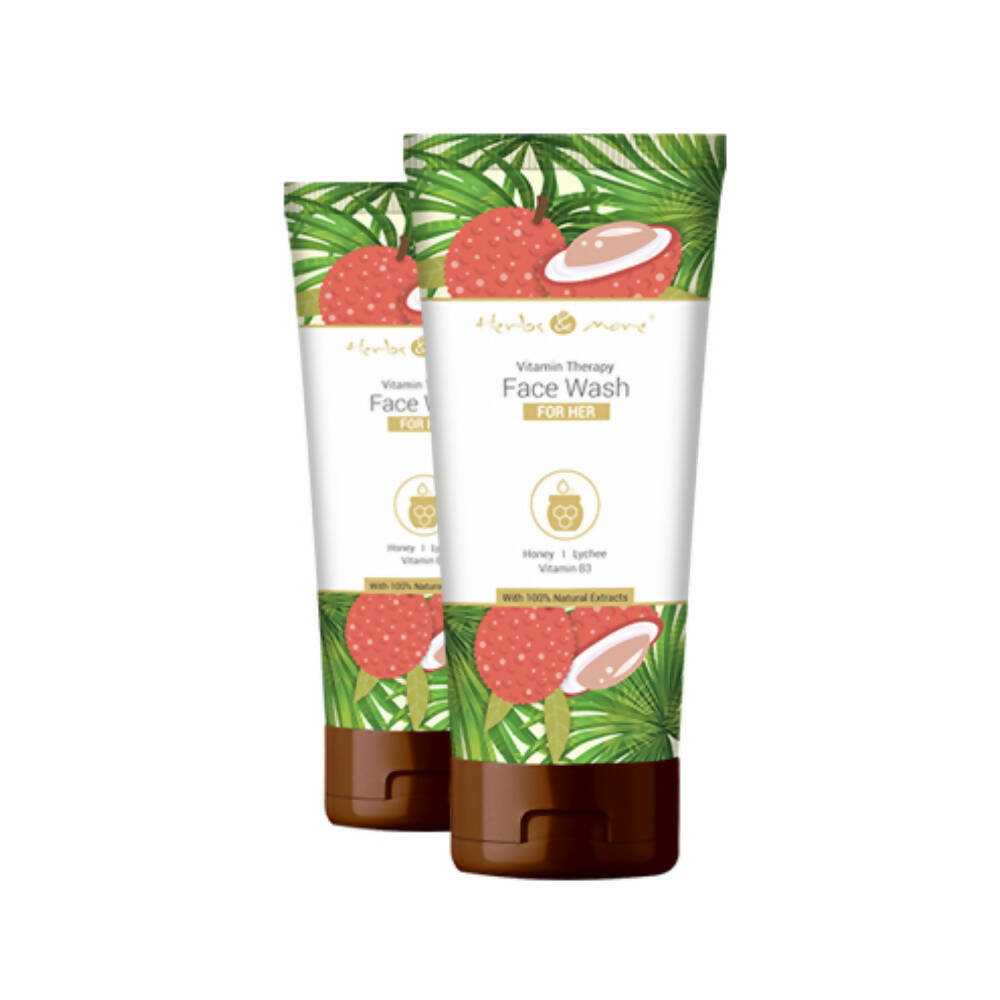 Two bottles of Vitamin Therapy Face Wash with tropical fruit design on a white background
