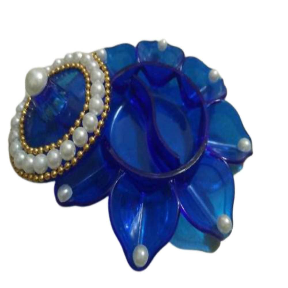 Blue decorative item with pearls on a white background