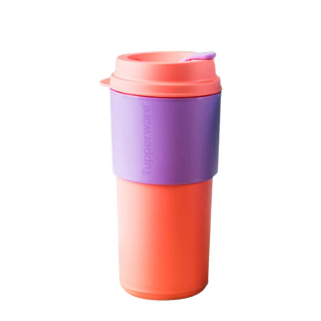 Colorful travel mug with a purple base and pink lid on a white background