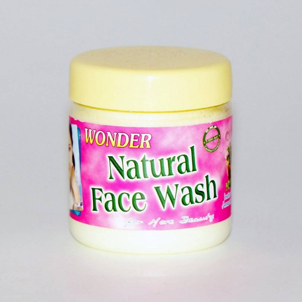 Jar of Wonder Natural Face Wash with a pink label on a gray background