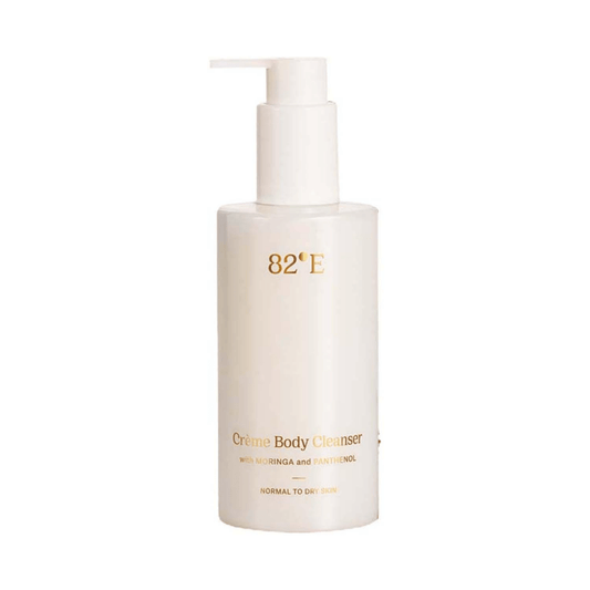 82E Creme Body Cleanser bottle on a white background