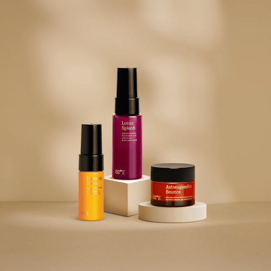 Three skincare products on a beige background