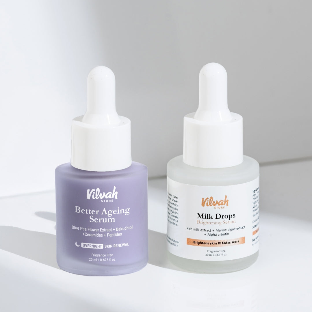 Two skincare bottles, 'Better Ageing Serum' and 'Milk Drops', by Vilvah on a light background.