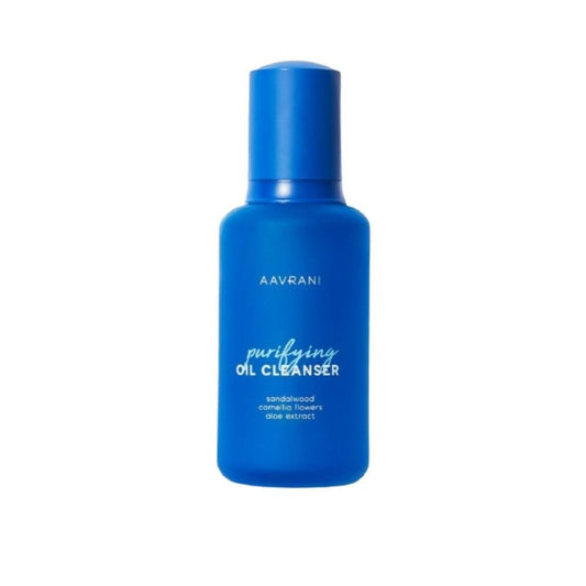 Blue bottle of Aavrani purifying oil cleanser on a white background