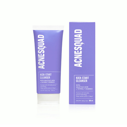 A packaged acne cleanser product with a purple and white color scheme, labeled 'Acne Squad Kick Start Cleanser With Salicylic Acid & Thymol T Essence'. The product is displayed next to its packaging box.