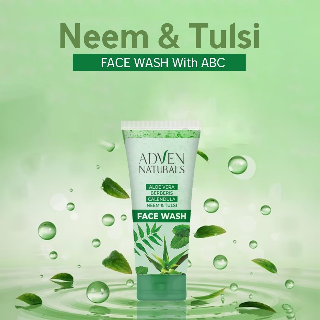 Adven Naturals Neem & Tulsi face wash tube on a green background with leaves and water droplets.