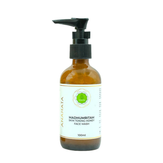 Brown bottle with pump and white label on a white background