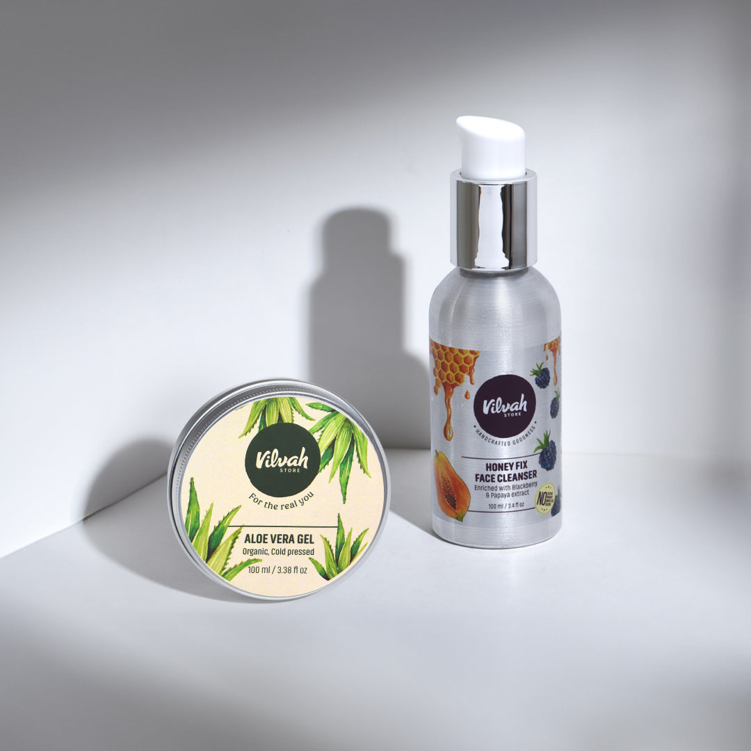 Vilvah skincare products including a bottle and a tin on a light gray background