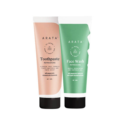 Two Arata skincare products, a pink toothpaste tube and a green face wash tube, on a white background.