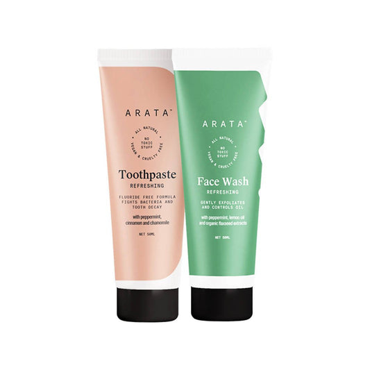 Two Arata skincare products, a pink toothpaste tube and a green face wash tube, on a white background.