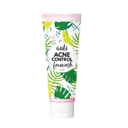 Acne control facewash tube with leaf pattern on a white background