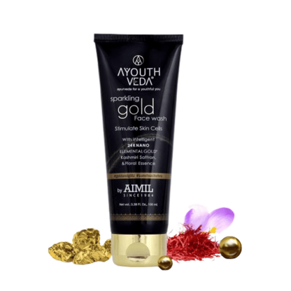A youth Veda sparkling gold face wash tube with decorative elements on a white background