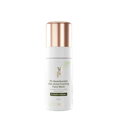 White bottle with gold cap of 2% Neembadam Anti-Acne Foaming Face Wash on a white background