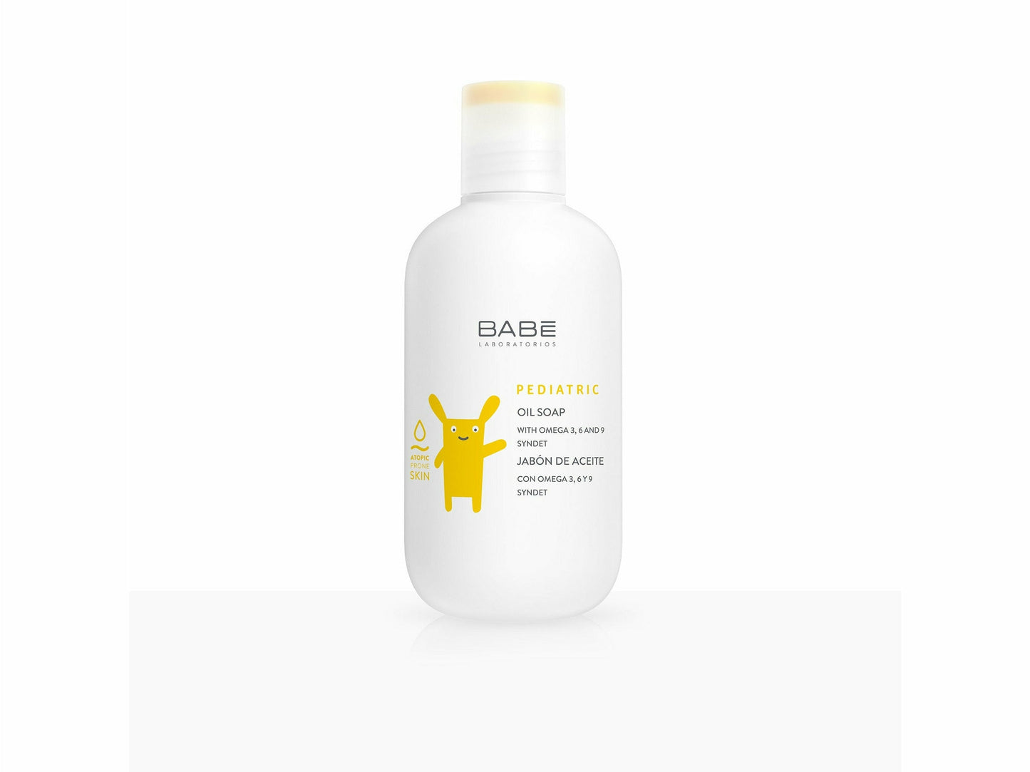 Bottle of Babe body wash with a yellow label on a white background