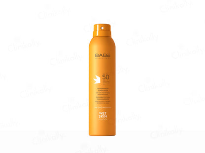 Orange spray bottle labeled 'Babe' on a white background
