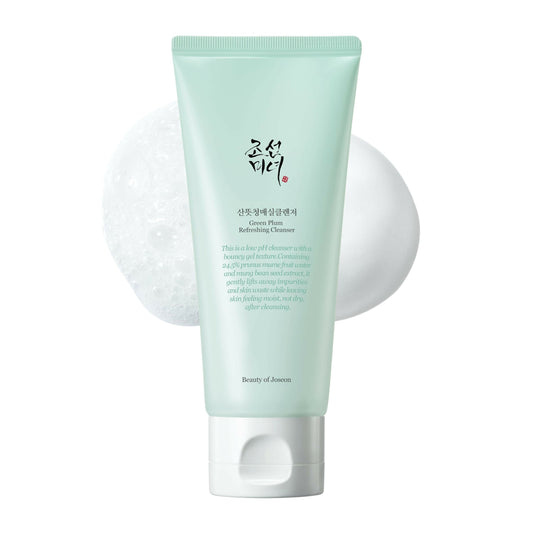 Green tube of cleanser with text on a white background