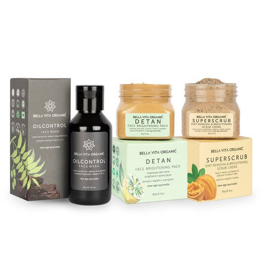 A collection of Bella Vita Organic skin care products including a charcoal face wash, super scrub, and detan pack, with packaging displaying the brand name and product details.