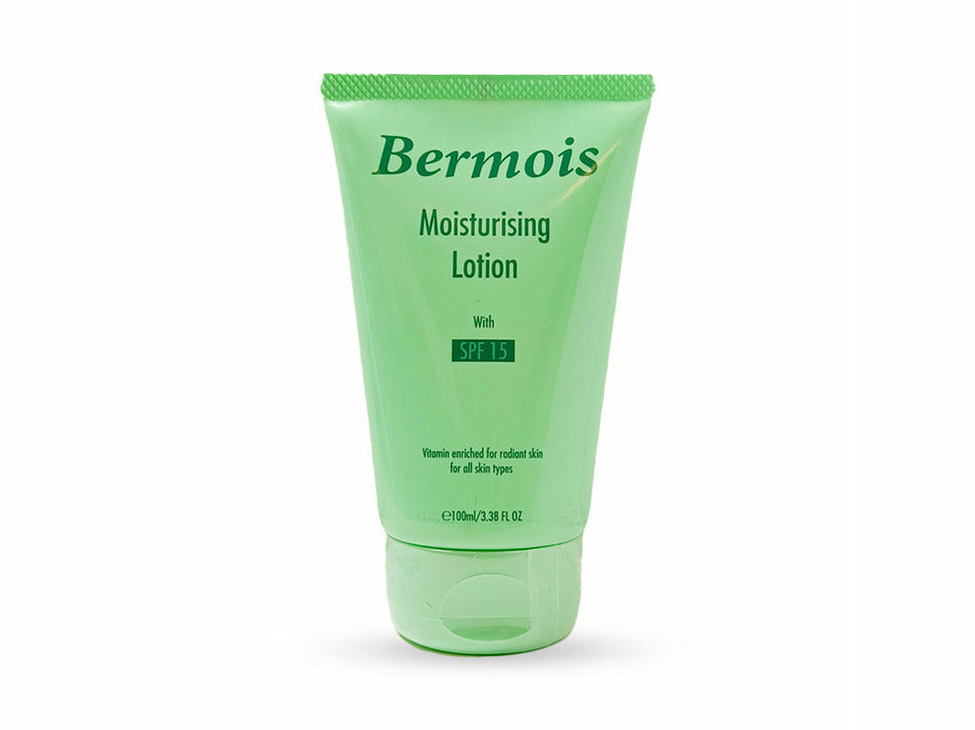 Green tube of Bermois moisturizing lotion on a white background