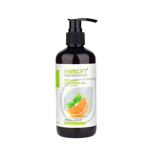 A bottle of Biosoft Pre Wax Cleansing Gel with a pump dispenser, featuring a white label with green and orange accents, and an image of an orange on the label.