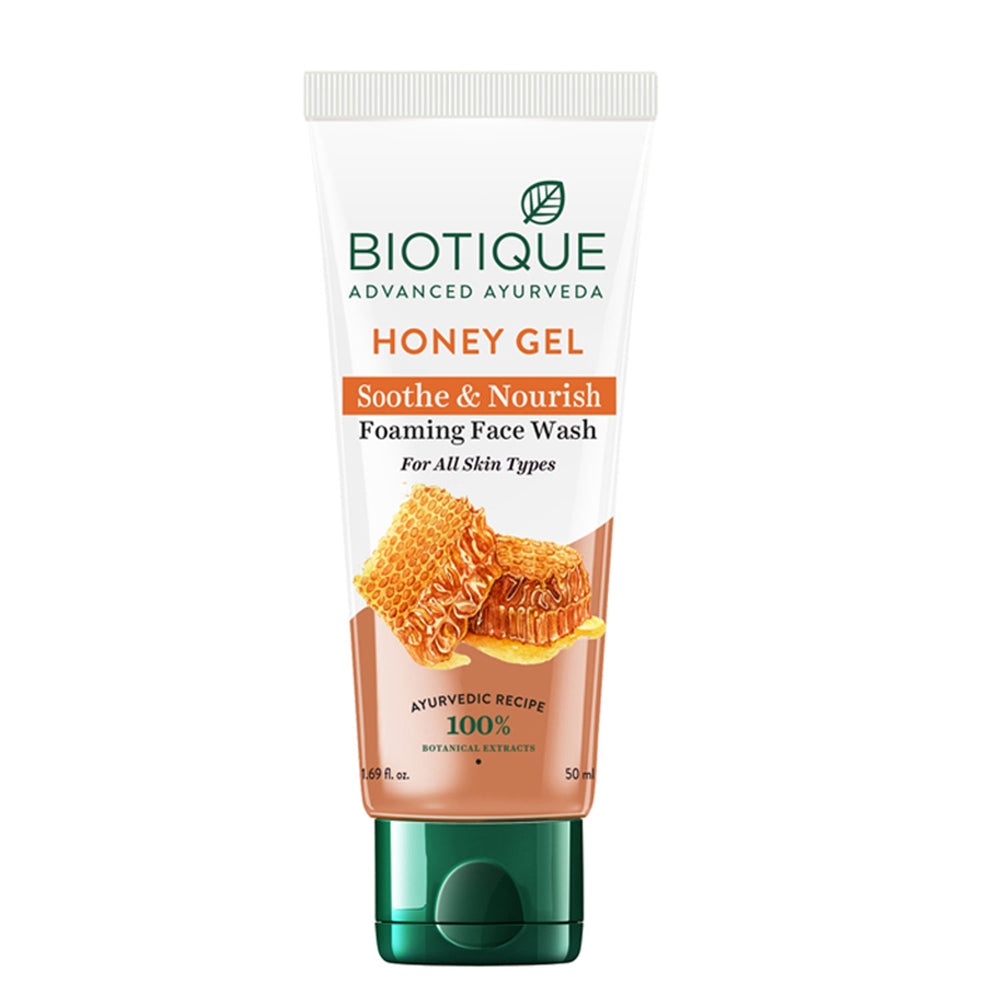 A tube of Biotique Advanced Ayurveda Bio Honey Gel Foaming Face Wash with an image of honeycomb on the label, indicating the product is for all skin types and includes honey as an ingredient.