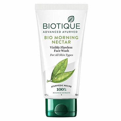 A tube of Biotique Advanced Ayurveda Bio Morning Nectar Visibly Flawless Face Wash with green accents on the packaging.