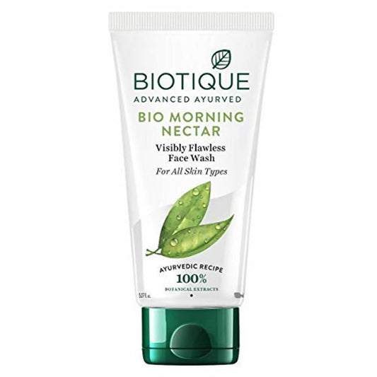 A tube of Biotique Advanced Ayurveda Bio Morning Nectar Visibly Flawless Face Wash with green accents on the packaging.