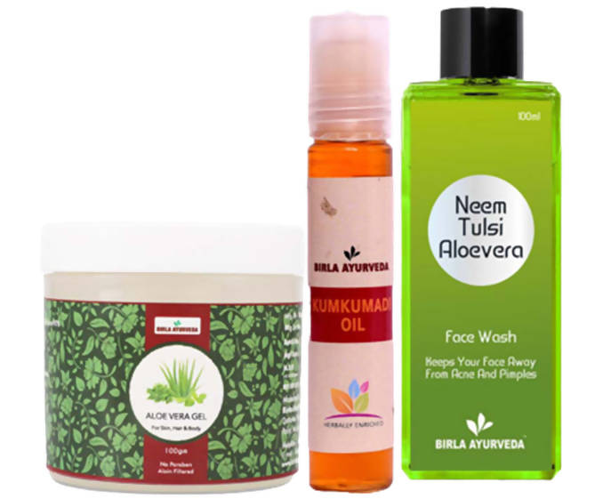 The image displays three products from Birla Ayurveda's face kit, including a jar labeled 'Aloe Vera Gel', a bottle marked 'Kumkumadi Oil', and a face wash bottle 'Neem Tulsi Aloevera Face Wash'.