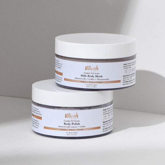 Two white jars with labels on a light gray background