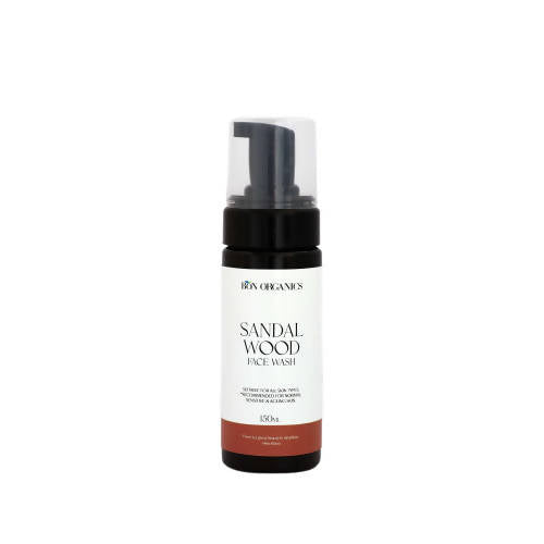 A bottle of Bon Organics Sandalwood Face Wash with a white pump dispenser, labeled with the product name and the scent, sandalwood.