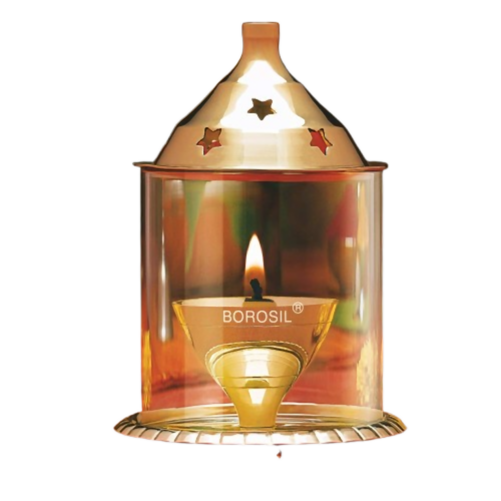 Borosil candle holder with a lit candle on a white background
