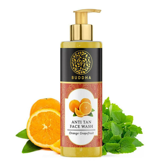 Bottle of Buddha Anti Tan Face Wash with oranges and mint leaves on a white background