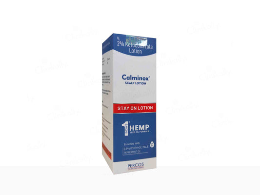 Box of Calminox scalp lotion with blue and white design on a white background