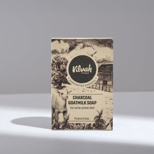 Vilvah Store charcoal goatmilk soap packaging on a gray background