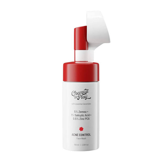Skincare bottle with red cap and white label on a white background