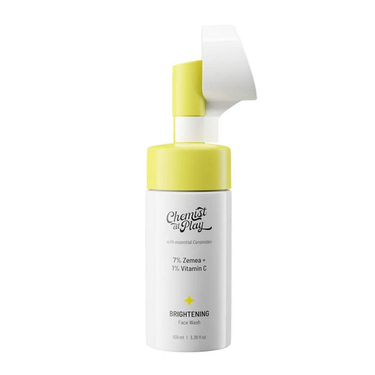 Skincare bottle with yellow cap and white body on a white background