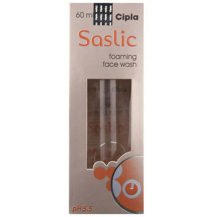 Packaging of Cipla Saslic Foaming Face Wash with a clear window showing the product bottle inside. The package is primarily white with orange accents and black text, indicating it is a skincare product.