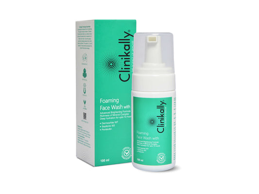 Clinikally foaming face wash bottle and packaging on a white background
