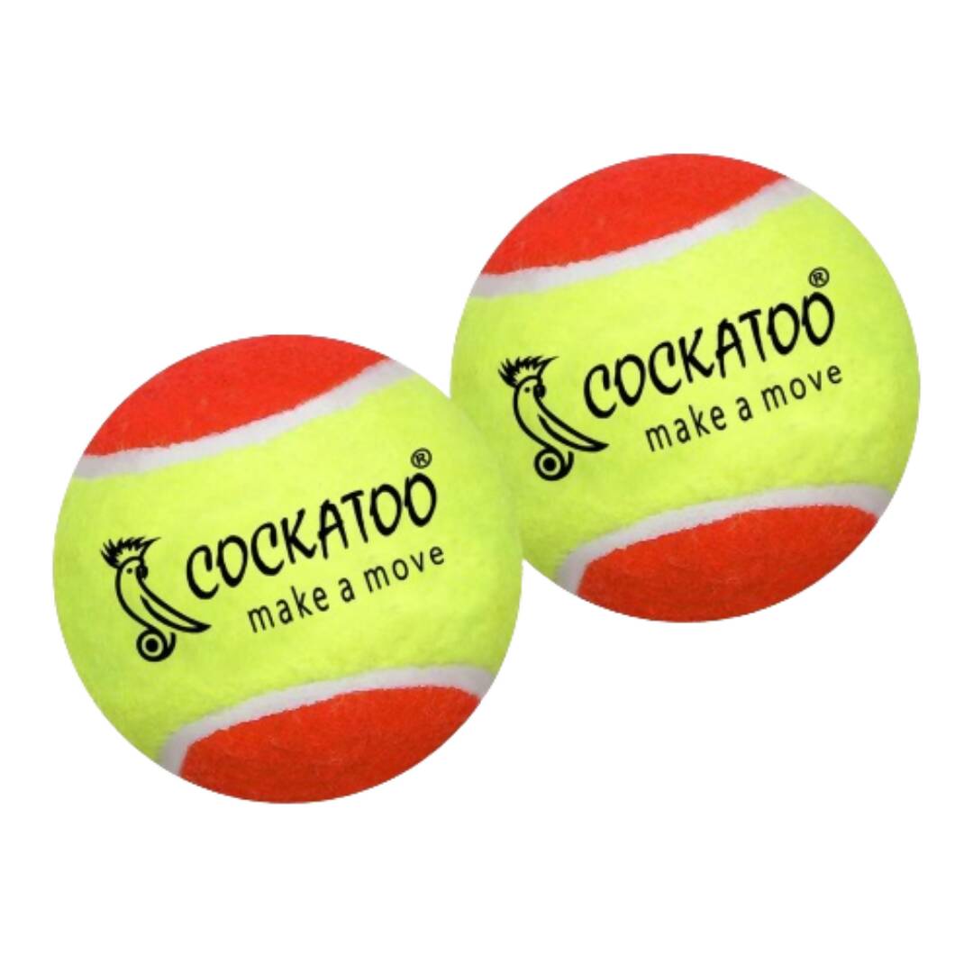 Two Cockatoo brand tennis balls with red and yellow colors on a white background