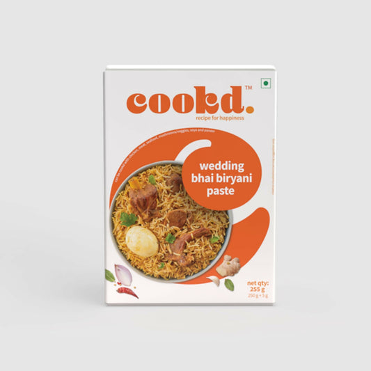 Box of 'cookd.' wedding bhai biriyani paste on a white background