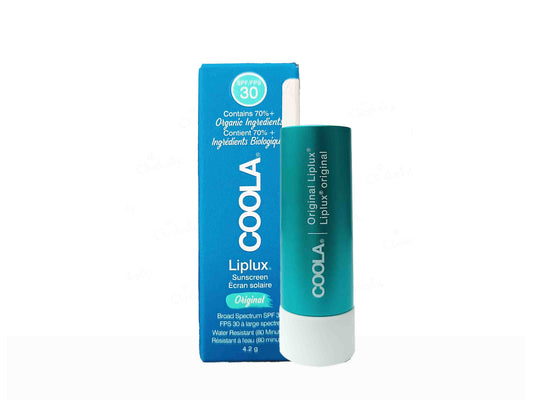 Coola lip balm with packaging on a white background
