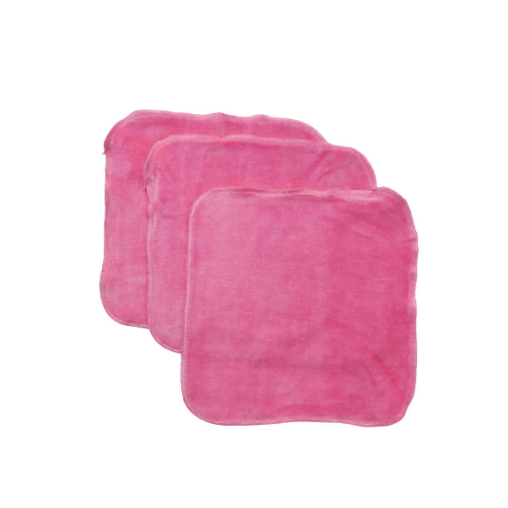 Three pink square washcloths on a white background