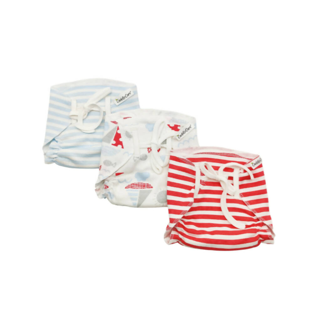 Three baby diapers with different patterns on a white background