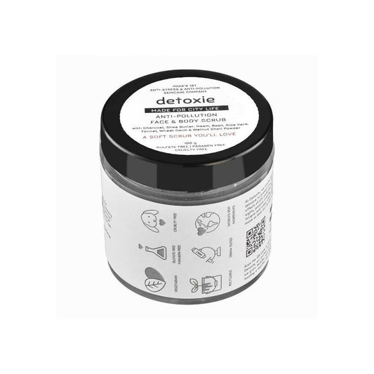 Jar of detoxie facial and body scrub on a white background