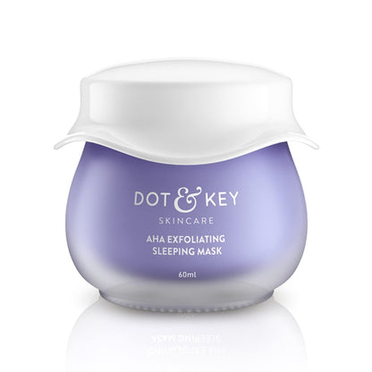 A jar of Dot & Key AHA Exfoliating Sleeping Face Mask with lactic and hyaluronic acid, designed for skin care.
