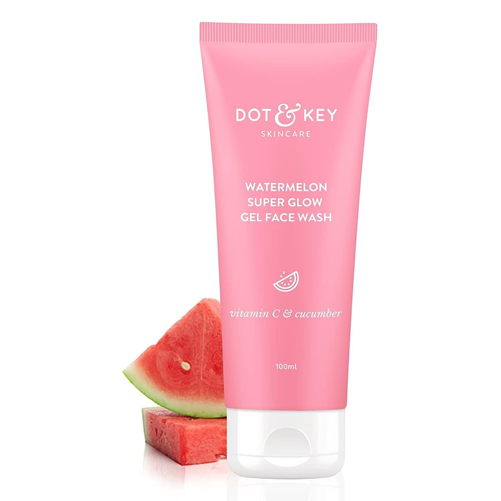 Pink tube of Dot & Key skincare face wash with watermelon slices on a white background