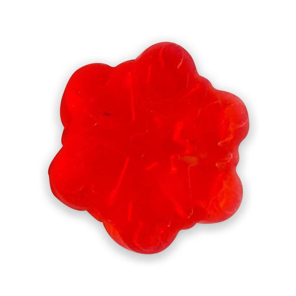 Red flower-shaped gelatin on a white background