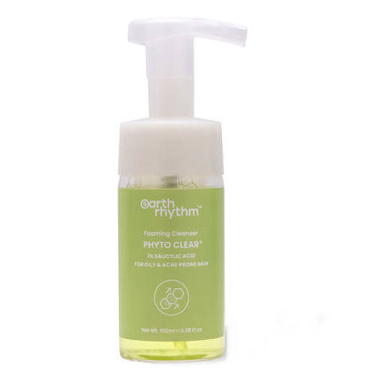 A pump bottle of Earth Rhythm Phyto Clear Foaming Cleanser with a green label.
