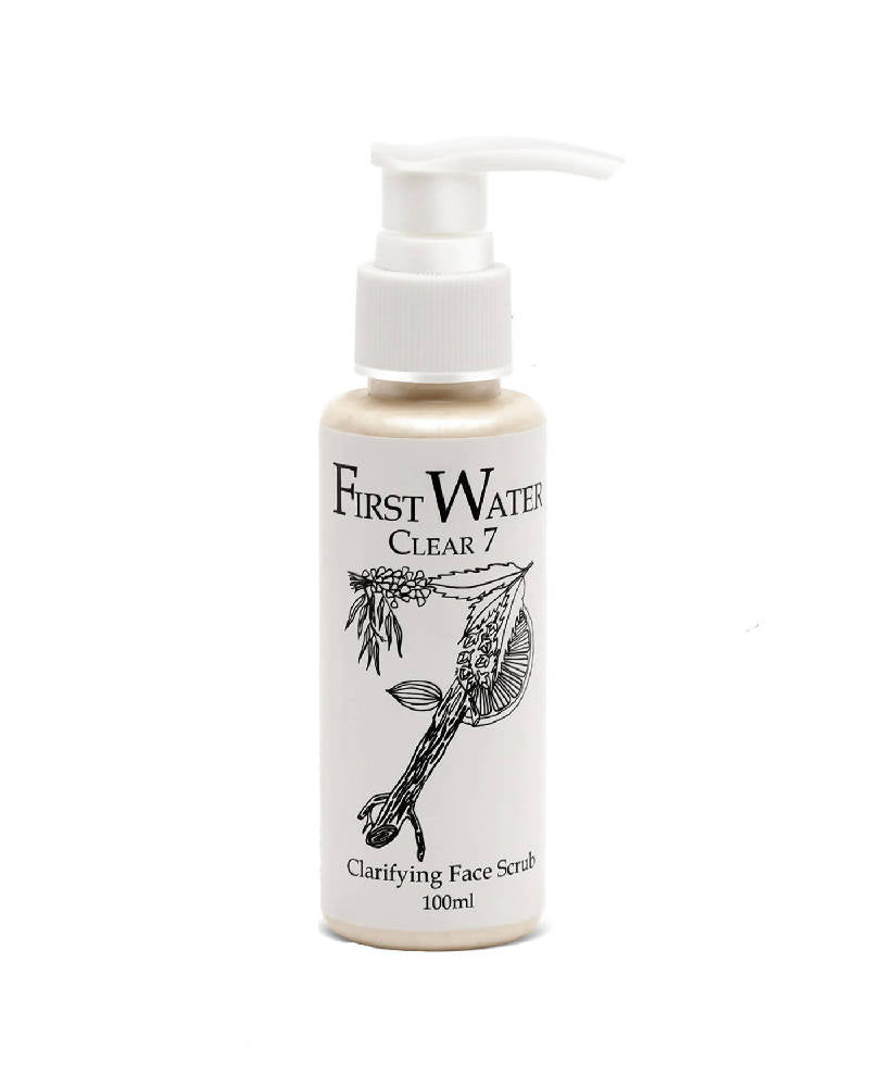 Bottle of First Water Clear 7 Clarifying Face Scrub on a white background